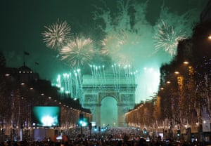 The Arc de Triomphe illuminated at midnight in Paris