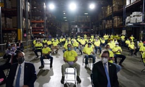 Trump commented on the employees’ social distancing. ‘That’s pretty impressive. But we like it the old way a little bit better don’t we?’