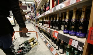 Shoppers choosing Champagne ahead of New Year’s Eve celebrations in a Sainsbury’s store in Tottenham, north London.
