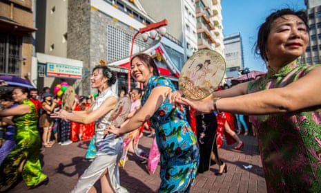 Chinese women dressed in traditional qipao take part in a flash mob in São Paulo, Brazil, 19 August.