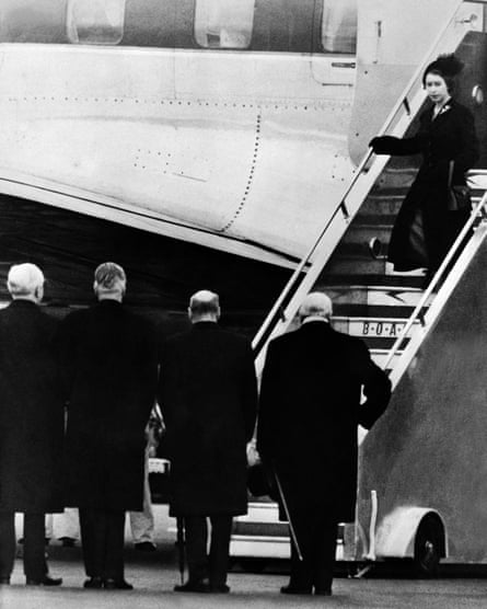 Queen Elizabeth II of England gets off plane, greeted by (from R to L) Sir Winston Churchill, Clement Attlee, Anthony Eden and Frederick James Marquis, 1st Earl of Woolton and Lord President of the Council, 8 February 1952, as she returns from Kenya