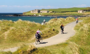 Explore the Irish coast by bike along routes such as the Runkerry Trail, which runs to the Giant’s Causeway.