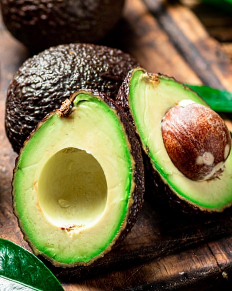 avocados on a wooden cutting board