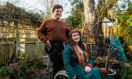 ‘Before, I was often infantilised, but my children seem to act as an automatic pass to adulthood’: Lucy and James Catchpole in their garden.