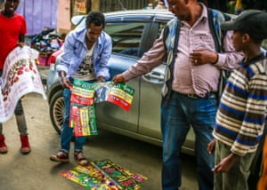 A vendor sells posters of Abiy Ahmed