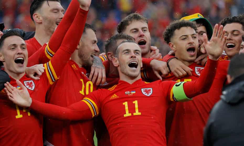 Gareth Bale and his Wales teammates celebrate after qualifying for the World Cup finals