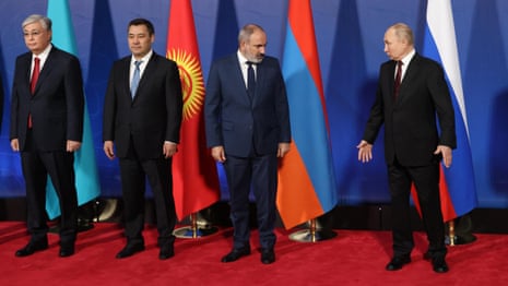 Armenian prime minister appears to step away from Putin in CSTO summit – video
