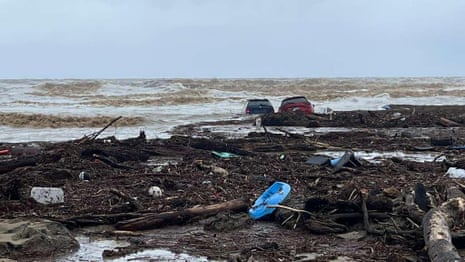 Cars swept out to sea as flash flooding hits Victoria's Great Ocean Road – video