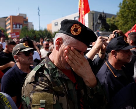 Supporters of former Kosovo President Hashim Thaçi react after he was found guilty of war crimes by the Kosovo war crimes tribunal in The Hague, in Pristina, Kosovo.