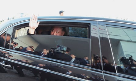 North Korean leader Kim Jong-un responds as Russian President Vladimir Putin sends him off from the Vostochny cosmodrome
