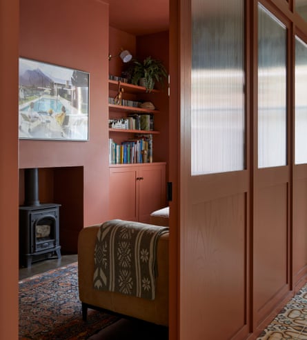 A corner sofa and simply and joinery screening