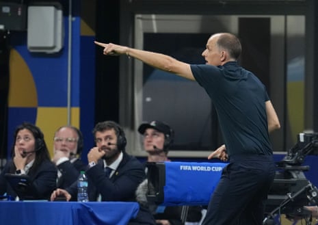 England manager Thomas Tuchel pointing to the left with an outstretched arm