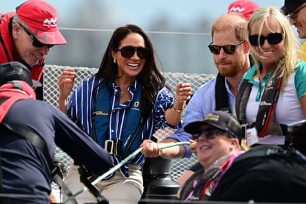 Prince Harry and Meghan on a tour of Sydney harbour with Invictus Australia