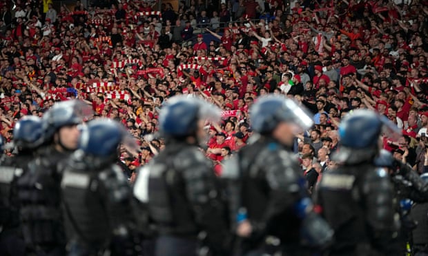 Riot police massed in front of Liverpool fans during May’s Champions League final.