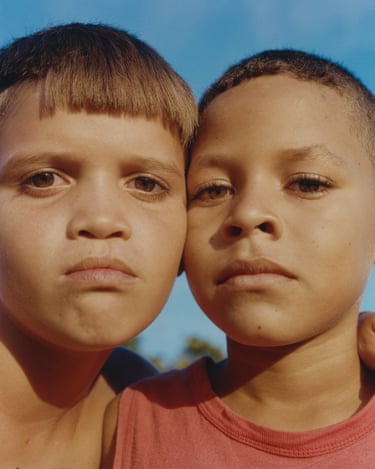 Isaac and Yonaiker, 2021 , two boys stare into the camera