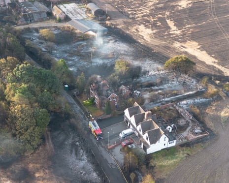 An aerial view shows burnt houses as the wildfire continues to spread Stourbridge, England.