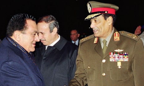Field Marshal Mohamed Tantawi, right, greeting Hosni Mubarak in Cairo, Egypt.