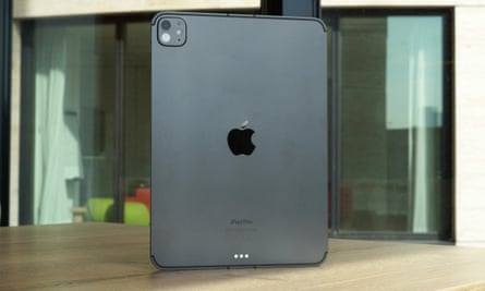 The back of the 11in iPad Pro M4 stood up on a table.