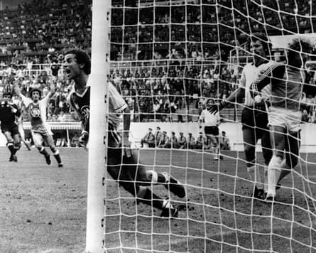 Algeria’s Lakhdar Belloumi turns and celebrates after scoring the second goal