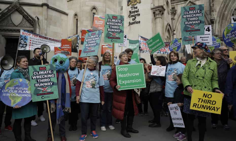Anti-Heathrow expansion campaigners protest outside the court of appeal in London