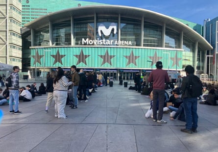 Fans line up on the street outside