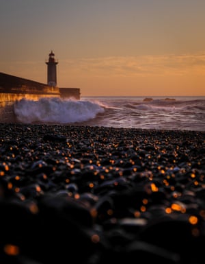 Farolim de Felgueiras, Portugal ‘The light of the sunset reflects on the black stones of the beach, drawing thousands of gold nuggets. Sometimes it takes little to see the beauty of life.’