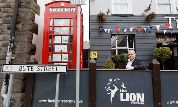 ‘Essential second in our historical past’: Welsh valleys city marks Queen’s funeral | Queen Elizabeth II 1 The Lion’s landlord, Adrian Emmet, outside the pub in Treorchy, Wales