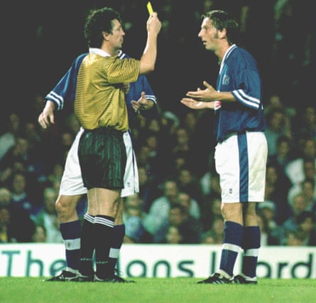 Garry Parker is shown the first of two yellow cards by referee Rémi Harrel