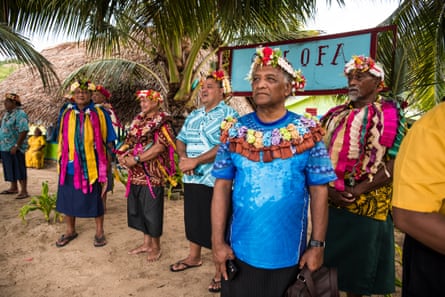 men stand in a line on Kioa island