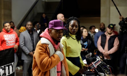 Chance the Rapper, who has endorsed Amara Enyia for mayor of Chicago, at a news conference on 16 October at City Hall as Enyia listens.