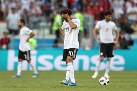 Mohamed Salah walks off after a disappointing campaign for Egypt.