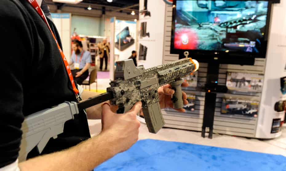 Gamer uses a U.S. Army Elite Force Assault Rifle Controller to play a video game at the 2012 International Consumer Electronics Show at the Las Vegas Convention Center. 