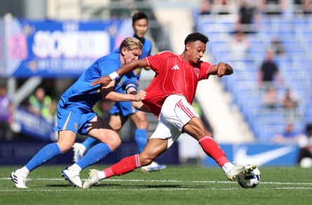 Dan Ndoye of Nottingham Forest battles for possession with Birmingham’s Christoph Klarer during a pre-season friendly.