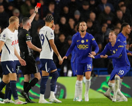 Cole Palmer reacts after being shown a red card by Chris Kavanagh.