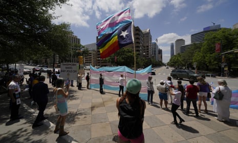 Demonstrators gather on the steps to the state capitol to speak against transgender related legislation bills being considered in the Texas senate and Texas house, on 20 May 2021, in Austin, Texas. 