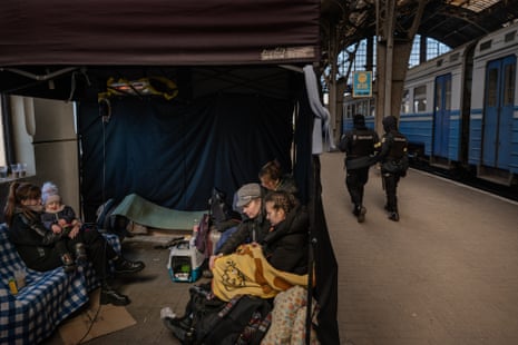 Evacuees from Eastern Ukraine rest in a tent set up at a platform in Lviv’s central station