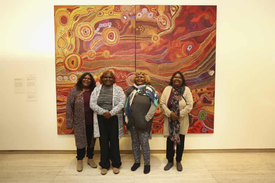 The Ken Family Collaborative pose with their work Seven Sisters, which won the 2016 Wynne prize