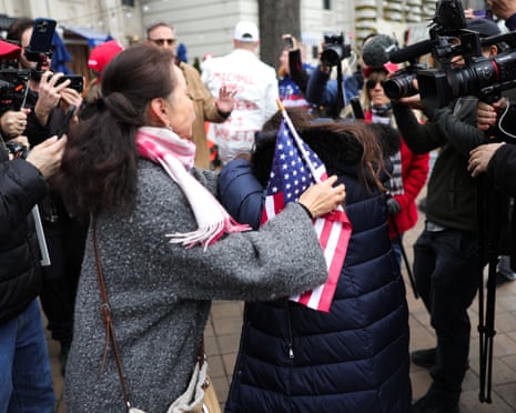 Counter-protester clashes with pro-riot demonstrators during the march on the from the Ellipse to the US Capitol on the fifth anniversary of the January 6 insurrection, 6 January 2026.