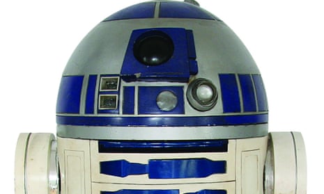 R2-D2 made from pieces salvaged from the Star Wars films by a British enthusiast which has been sold for 2.76 million dollars (£2.13m).