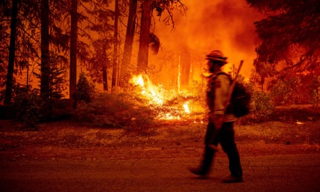 Firefighters monitor a backfire