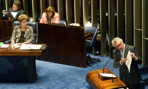 President Dilma Rousseff listens to a question by Senator Ronaldo Caiado during her impeachment trial.