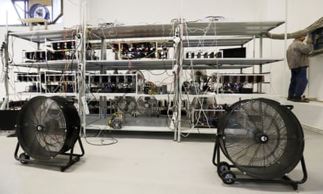 Computer equipment and cooling fans a bitcoin mining facility.