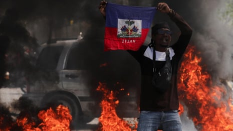 Haiti declares curfew after thousands of inmates escape jail – video report