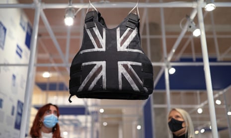 A customised stab-proof vest designed by Banksy and worn by Stormzy hangs in the Design Museum in London.