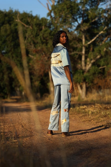 Roman Mununggurr wearing Bula’Bula Arts x Black Cat Couture’s collection Garkambarryirri (Daybreak)