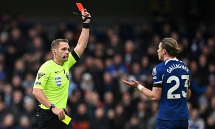 Conor Gallagher (right) is sent off by Craig Pawson