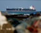 FILE PHOTO: An LPG gas tanker at anchor as traffic is down in the Strait of Hormuz, in ShinasFILE PHOTO: An LPG gas tanker at anchor as traffic is down in the Strait of Hormuz, amid the U.S.-Israeli conflict with Iran, in Shinas, Oman, March 11, 2026. REUTERS/Benoit Tessier/File Photo