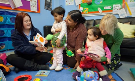 Children and carers at a Sure Start centre