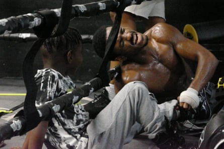 Large dipper, boxing and bikers in LA: Wembley to Soweto initiative 2022 – photograph essay | Pictures 29 No pain, no gain – a man trains in TG Boxing Gym, South Central LA, as his son looks on