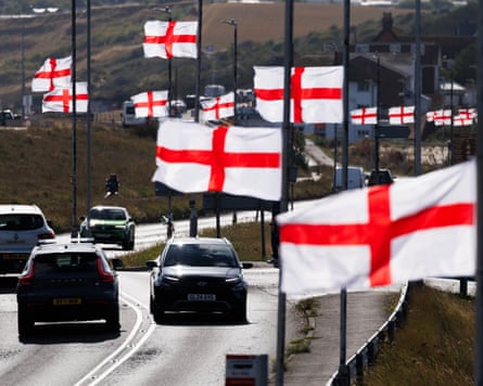 A road where every lamp-post has a big England flag attached